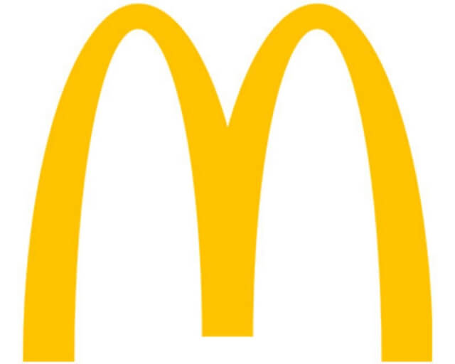 The iconic golden arches of the McDonald's logo, symbolizing fast food in Grand County Colorado.