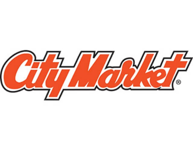 The City Market logo features bold red cursive text with a white outline in Grand County Colorado.