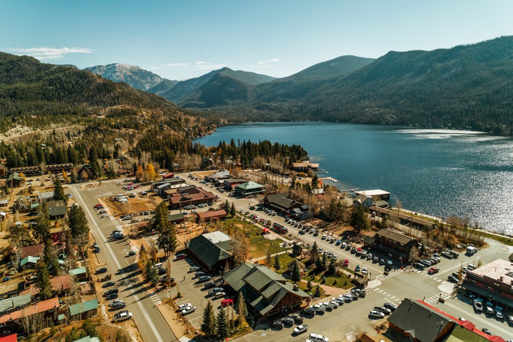 Aerial view of Grand Lake with mountains in the background.