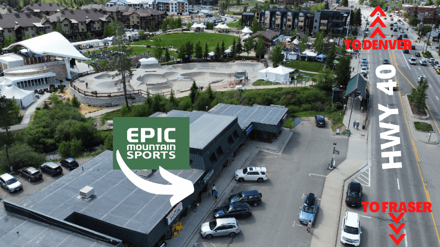 Aerial view of a mountain sports complex with parking lot and surrounding buildings in Grand County Colorado.